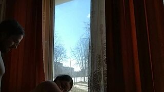 Helga Bosk engages in risky sex by the window as people walk by.