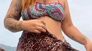 i got naked on the beach in front of the guy he got hard and i grabbed his cock