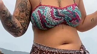 i got naked on the beach in front of the guy he got hard and i grabbed his cock