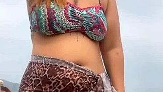 i got naked on the beach in front of the guy he got hard and i grabbed his cock