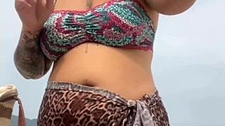 i got naked on the beach in front of the guy he got hard and i grabbed his cock