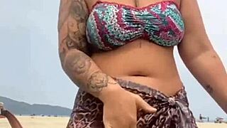 i got naked on the beach in front of the guy he got hard and i grabbed his cock