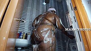 Ebony couple shower intimacy