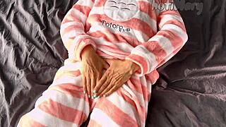 Petite teen in pajama masturbating to orgasm