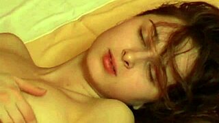 that sweet brunette is fingering her pussy hard, close up view.