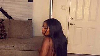 Ebony divine shakes fat ass and big tits on pole intensely