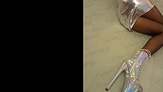 total silver and fishnet pantyhose with beautiful ankle boots and high heels