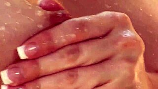 Capri Anderson casually gets off in the backyard, getting sprayed and fingered to orgasm