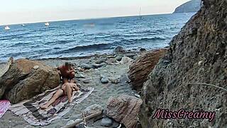 girl flashes on public beach and gets help