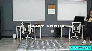 Ebony masseuse Nina White gives wet nuru massage with her perfect natural big boobs to Evan Stone