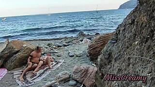 girl flashes on public beach and gets help