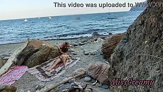 girl flashes on public beach and gets help