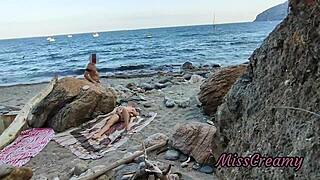 girl flashes on public beach and gets help