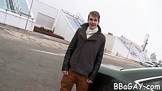 Explicit gay hunk sucking cock in racy oral sex scene