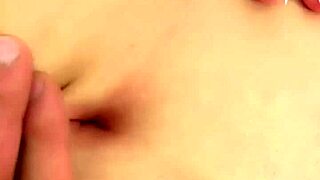 Intensely fingering this beautiful navel