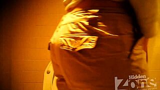 Beautiful girl pees standing up in toilet