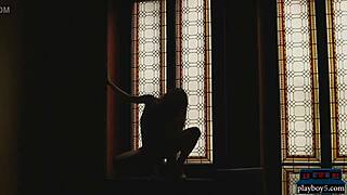 Petite teen beauty Sabina Rouge slowly undresses in softcore striptease posing