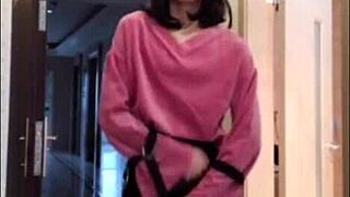 Asian ladyboy showing off to woman