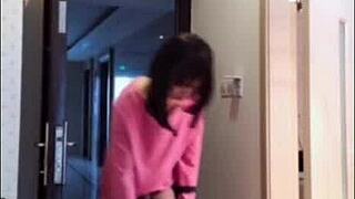 Asian ladyboy showing off to woman