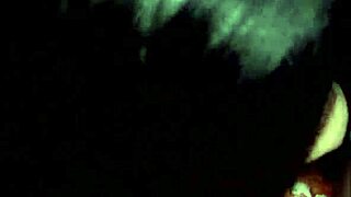 Hot brunette sucks big cock in gloryhole