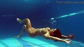 canadian milf heidi feels horny in the pool