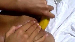 Blonde babe enjoys deep banana play outdoors with toys and fingering