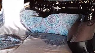 total black with fishnets pantyhose and boots over the knee