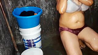 Big ass milf bathing and washing her boobs.