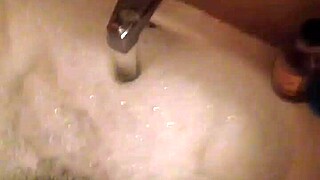amateurs record a person taking a bath in homemade setting, part 1 and 2, enjoying the simple bath time
