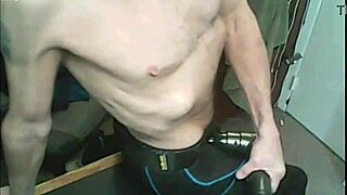 Stretching With Massage Gun With Compression Tights And Brace Bound