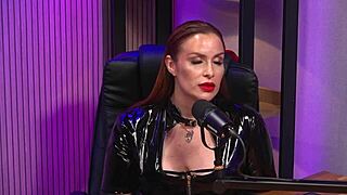 Is the redhead milf the queen domme of bdsm? She dominates with passion.