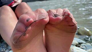 Goddess teases with nylon soles on riverside 😘