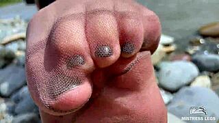 Goddess teases with nylon soles on riverside 😘