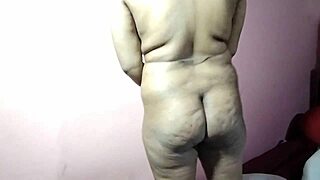 Curvy Indian woman masturbates intensely on bed with huge natural tits for first time