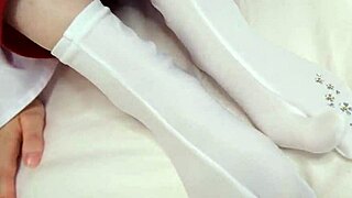 japanese beauty in traditional socks teases with footjob and handjob play