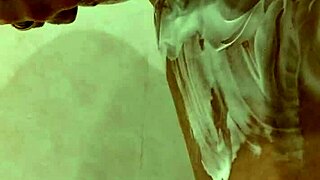 NAKED BIG TITS MILF LATHERS UP IN STEAMY SHOWER SHOWDOWN!