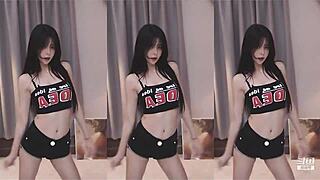 Slim Chinese girl's teasing body dance