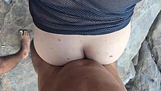 Two muscular beach babes take huge cocks at once