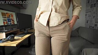 naughty milf secretary teases fat cameltoe pussy lips through tight trousers up close