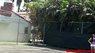 sorority babes haze each other with pussy eating on tennis court