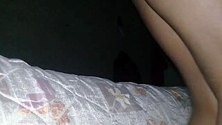 Black teen plays with her small perky tits teasingly