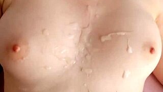 amateur babe's handjob ends in huge cumshot splashing her big tits pov