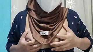 pretty hijab student pleasures herself alone in quiet house