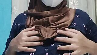 pretty hijab student pleasures herself alone in quiet house