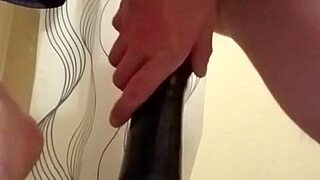 she slides the dildo deep into her ass for intense anal pleasure waves