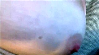 busty tanned blonde's tits drenched in hot cum