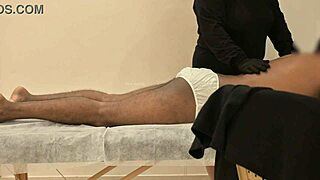 Hidden cam catches masseuse's teasing handjob finish