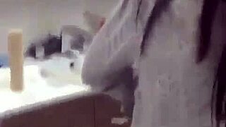 Woman struts publicly flashing shaved pussy in outdoor group tease display