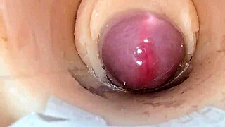 Camera dives deep inside shaved pussy exploding with massive creampie cum