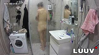 beautiful alice shaves intimately for reality show shower cameras